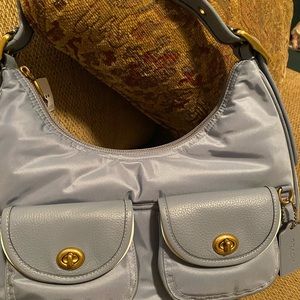 Brand new, never used light blue COACH hobo style bag!
